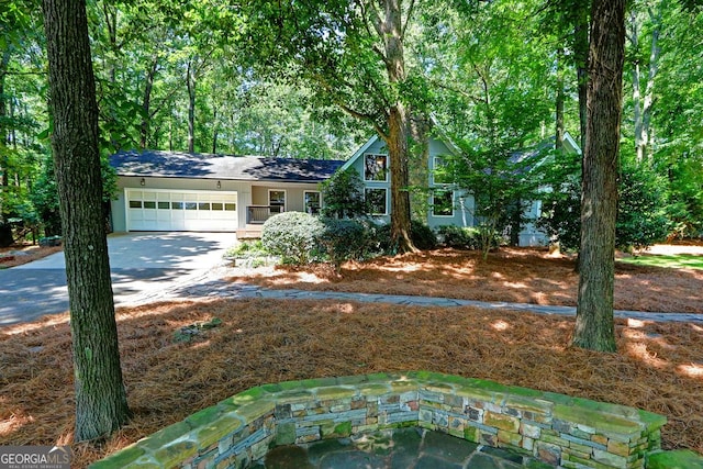 4393 Cannon Rd, Loganville, GA 30052 - view of front facade with an attached garage and concrete driveway