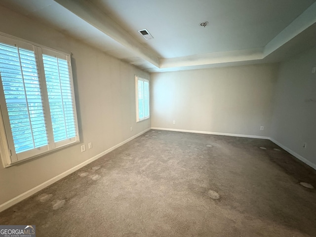 248 Webster Lake Dr, Temple, GA 30179 - empty room with a raised ceiling, dark carpet, and a pendent fire sprinkler
