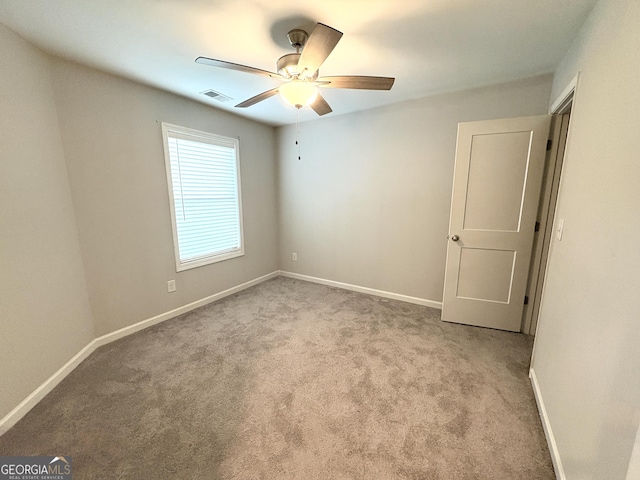 248 Webster Lake Dr, Temple, GA 30179 - carpeted empty room with a ceiling fan and baseboards