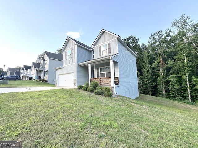 248 Webster Lake Dr, Temple, GA 30179 - view of front of property featuring a garage, board and batten siding, concrete driveway, a front lawn, and a porch