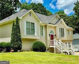 507 Legacy Park Ln, Powder Springs, GA 30127 - raised ranch with a front yard