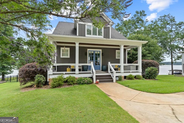 202 Jackson Rd SE, Milledgeville, GA 31061 - view of front of house with a water view and covered porch