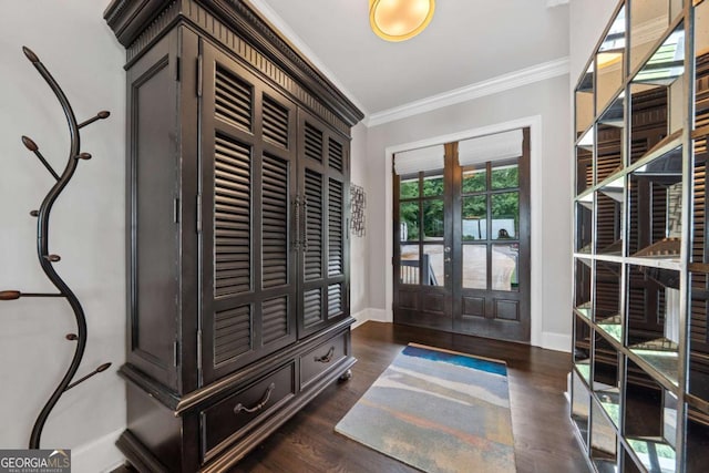 202 Jackson Rd SE, Milledgeville, GA 31061 - foyer entrance featuring french doors, ornamental molding, and dark wood-style flooring