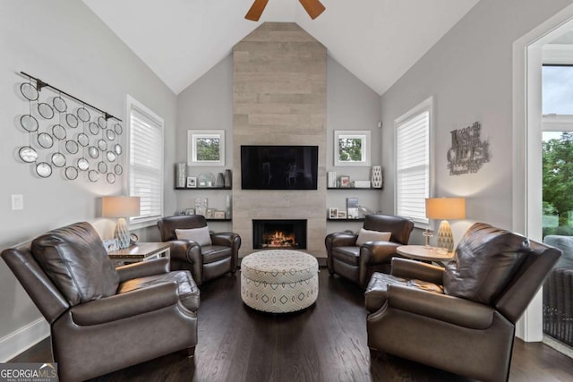 202 Jackson Rd SE, Milledgeville, GA 31061 - living room featuring ceiling fan, a tiled fireplace, wood finished floors, and high vaulted ceiling