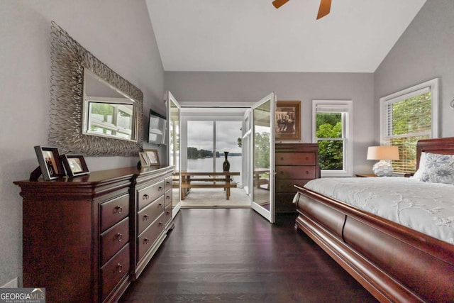 202 Jackson Rd SE, Milledgeville, GA 31061 - bedroom featuring vaulted ceiling, dark wood-type flooring, and access to exterior