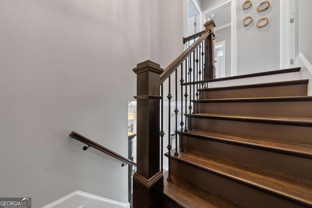 202 Jackson Rd SE, Milledgeville, GA 31061 - stairway featuring baseboards
