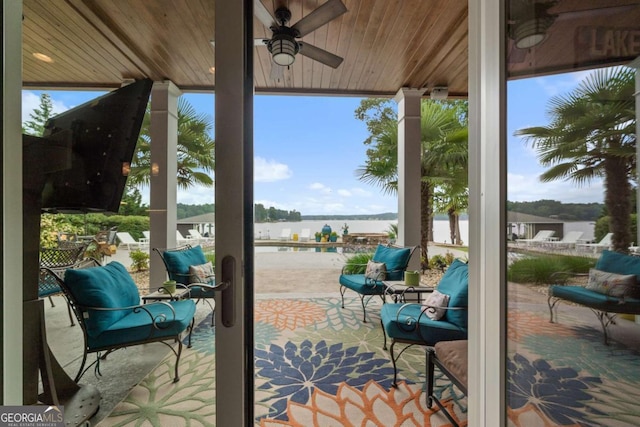 202 Jackson Rd SE, Milledgeville, GA 31061 - view of patio featuring a water view and ceiling fan