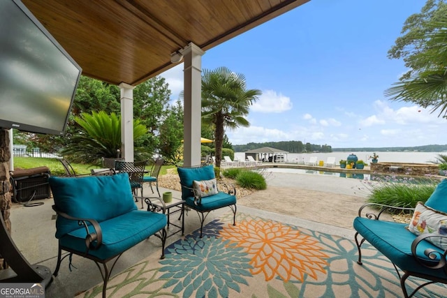 202 Jackson Rd SE, Milledgeville, GA 31061 - view of patio with an outdoor pool and a water view