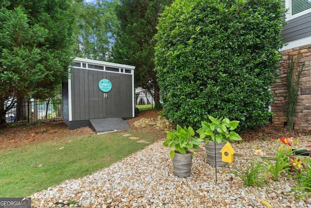 202 Jackson Rd SE, Milledgeville, GA 31061 - view of yard featuring a storage shed