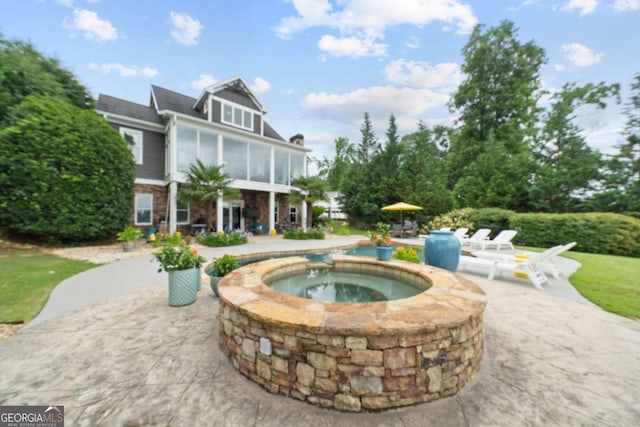 202 Jackson Rd SE, Milledgeville, GA 31061 - view of home's community with a hot tub and a patio area