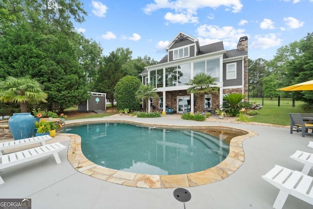 202 Jackson Rd SE, Milledgeville, GA 31061 - view of swimming pool featuring a patio area