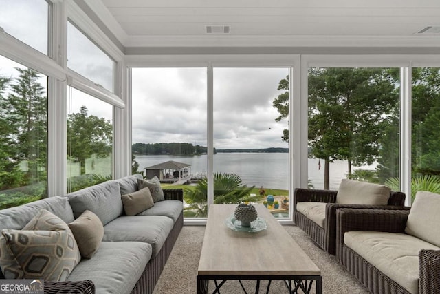 202 Jackson Rd SE, Milledgeville, GA 31061 - sunroom / solarium featuring a water view