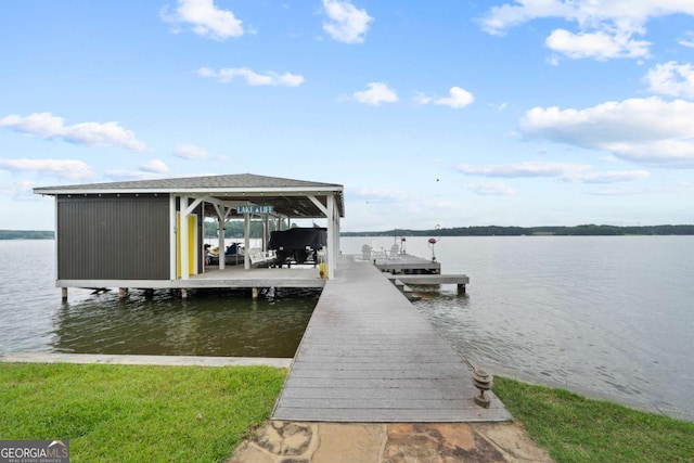 202 Jackson Rd SE, Milledgeville, GA 31061 - dock featuring boat lift and a water view