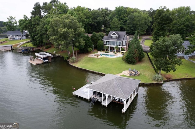 202 Jackson Rd SE, Milledgeville, GA 31061 - dock area featuring boat lift, a water view, a yard, and an outdoor pool