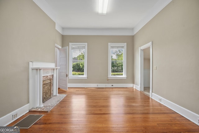 124 Hines Ter, Macon, GA 31204 - unfurnished living room with wood-type flooring and baseboards