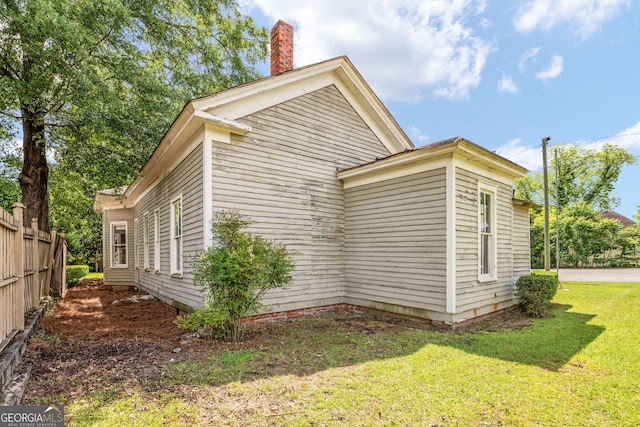 124 Hines Ter, Macon, GA 31204 - view of property exterior featuring a chimney