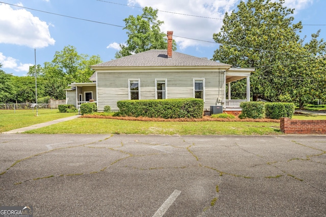 124 Hines Ter, Macon, GA 31204 - view of front of home featuring a chimney and covered porch