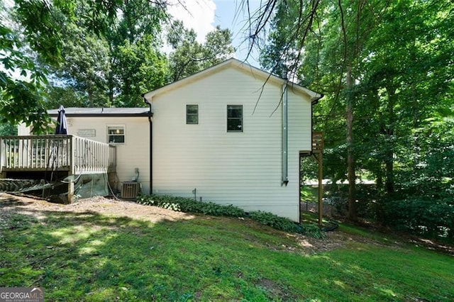 86 Kelly, Dallas, GA 30157 - view of home's exterior featuring a deck and a yard