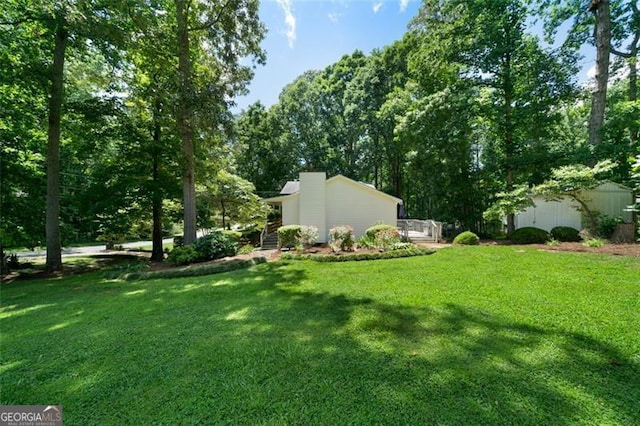 86 Kelly, Dallas, GA 30157 - view of grassy yard with an outdoor structure