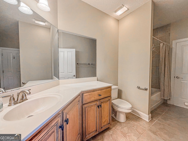 152 Huron Loop, Brunswick, GA 31523 - full bathroom featuring vanity, tile patterned flooring, shower / bath combo, and a textured ceiling