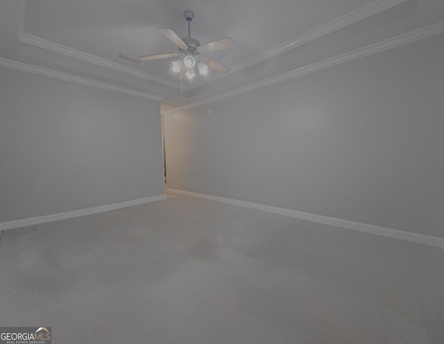 152 Huron Loop, Brunswick, GA 31523 - unfurnished room featuring a ceiling fan, ornamental molding, light colored carpet, and a raised ceiling