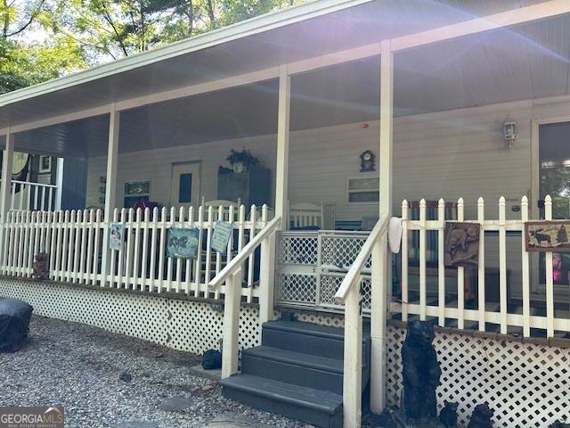 39 Terrace Cir, Cleveland, GA 30528 - entrance to property featuring a porch