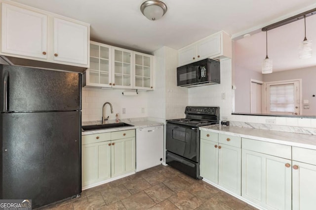 1784 Treymire Ct, Stone Mountain, GA 30088 - kitchen with black appliances, backsplash, glass insert cabinets, and white cabinetry