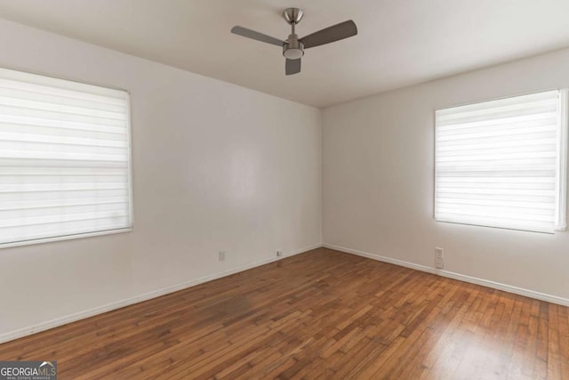 1784 Treymire Ct, Stone Mountain, GA 30088 - spare room with ceiling fan, hardwood / wood-style floors, and healthy amount of natural light