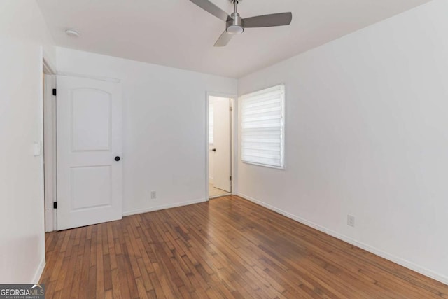 1784 Treymire Ct, Stone Mountain, GA 30088 - empty room with hardwood / wood-style floors, a ceiling fan, and a smoke detector