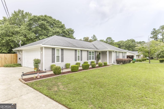 105 Shadow Ln, Warner Robins, GA 31088 - single story home featuring driveway, an attached garage, and roof with shingles