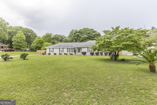 105 Shadow Ln, Warner Robins, GA 31088 - ranch-style home featuring a front lawn