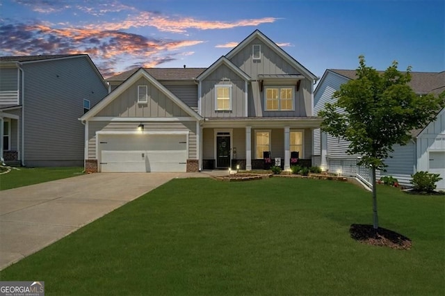 349 Garnet Dr, Acworth, GA 30101 - craftsman inspired home featuring board and batten siding, covered porch, driveway, a front yard, and a garage