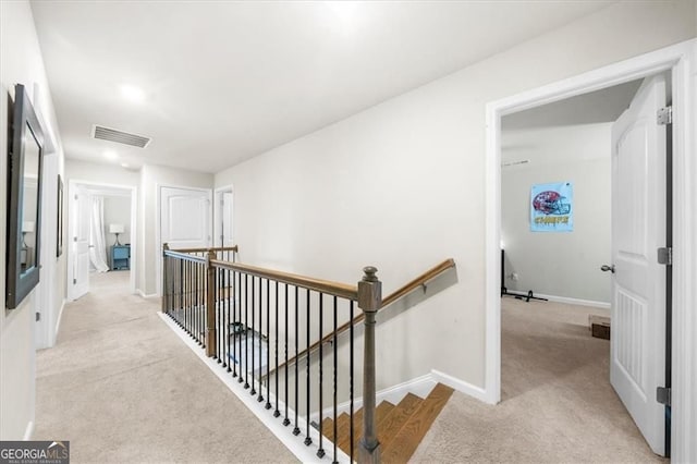 349 Garnet Dr, Acworth, GA 30101 - hall with an upstairs landing and light colored carpet