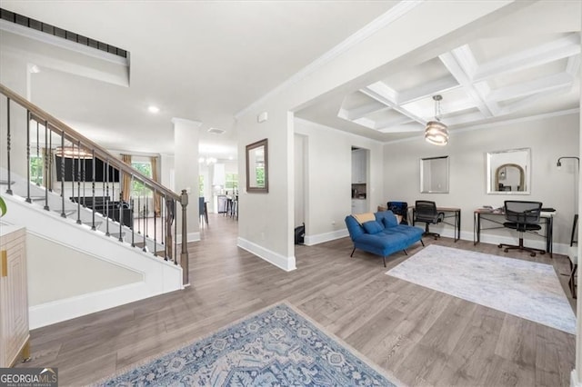 349 Garnet Dr, Acworth, GA 30101 - living area with wood finished floors, stairs, a chandelier, recessed lighting, and beamed ceiling