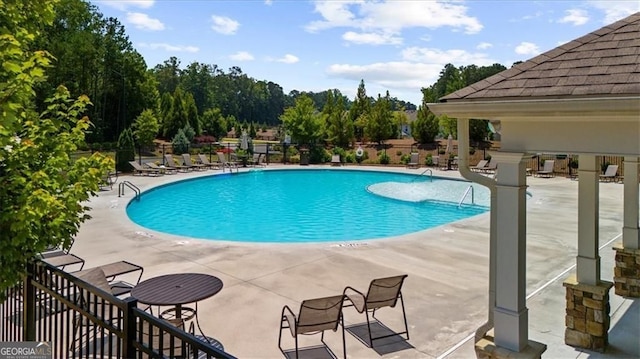349 Garnet Dr, Acworth, GA 30101 - community pool with a patio
