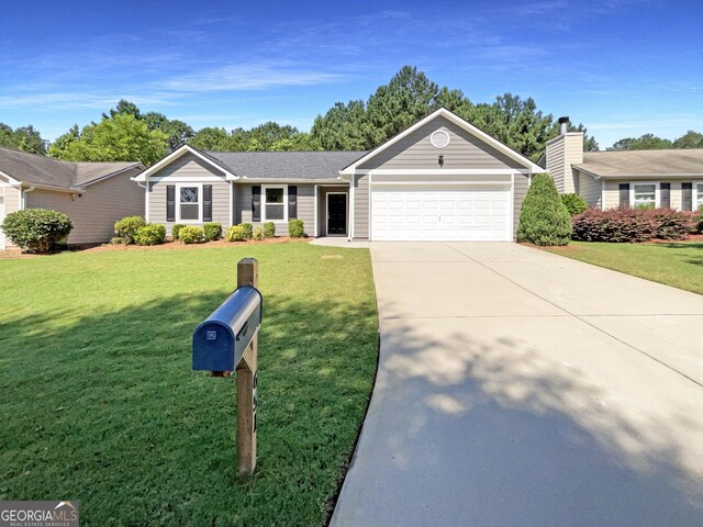 651 Walnut Woods Dr, Braselton, GA 30517 - ranch-style home with an attached garage, driveway, a front yard, and a shingled roof