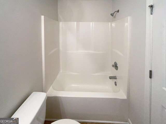 651 Walnut Woods Dr, Braselton, GA 30517 - bathroom with toilet and bathtub / shower combination
