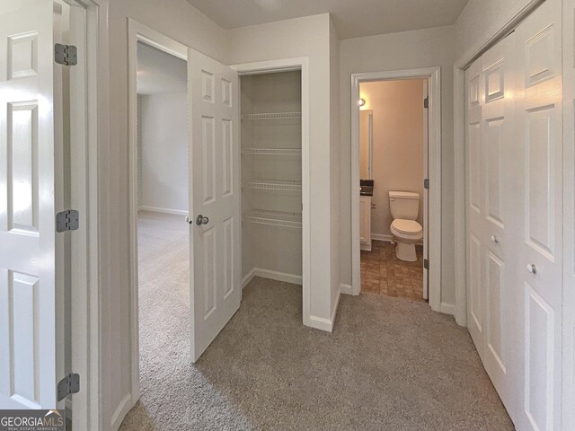 651 Walnut Woods Dr, Braselton, GA 30517 - corridor with carpet floors and baseboards
