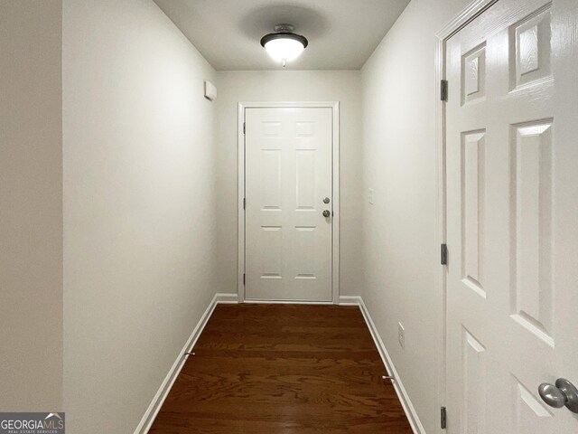 651 Walnut Woods Dr, Braselton, GA 30517 - entryway featuring dark wood finished floors and baseboards