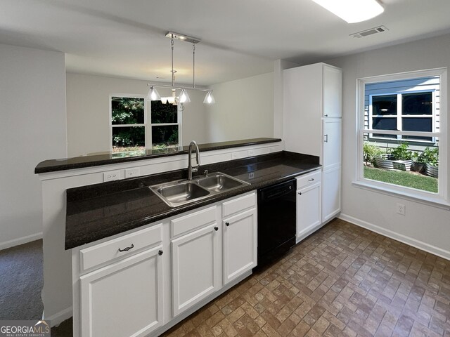 651 Walnut Woods Dr, Braselton, GA 30517 - kitchen featuring dishwasher, dark countertops, white cabinets, and plenty of natural light
