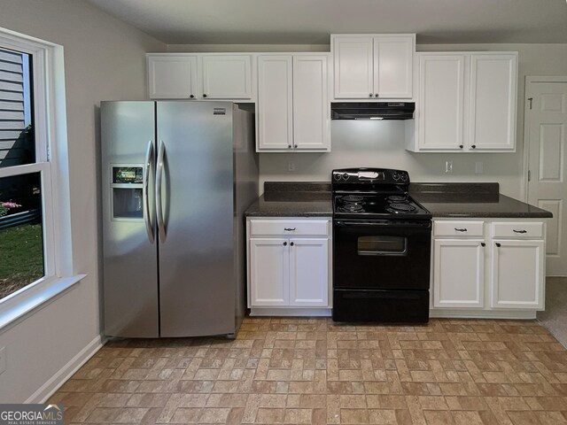 651 Walnut Woods Dr, Braselton, GA 30517 - kitchen with stainless steel refrigerator with ice dispenser, black electric range oven, brick patterned floors, and range hood
