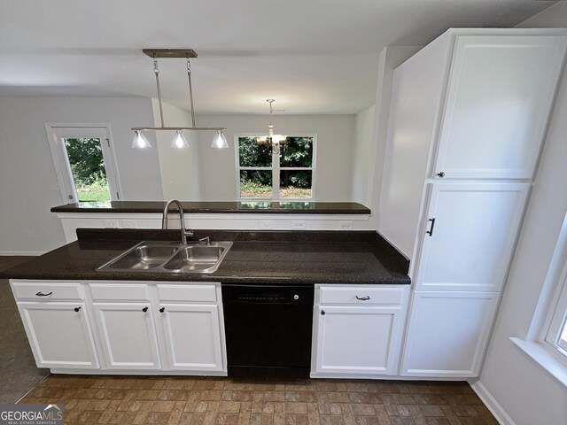 651 Walnut Woods Dr, Braselton, GA 30517 - kitchen featuring black dishwasher, healthy amount of natural light, white cabinets, and decorative light fixtures