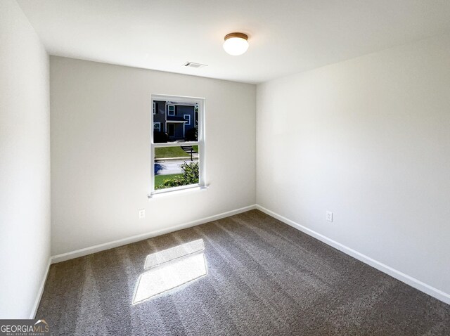 651 Walnut Woods Dr, Braselton, GA 30517 - spare room with carpet flooring and baseboards