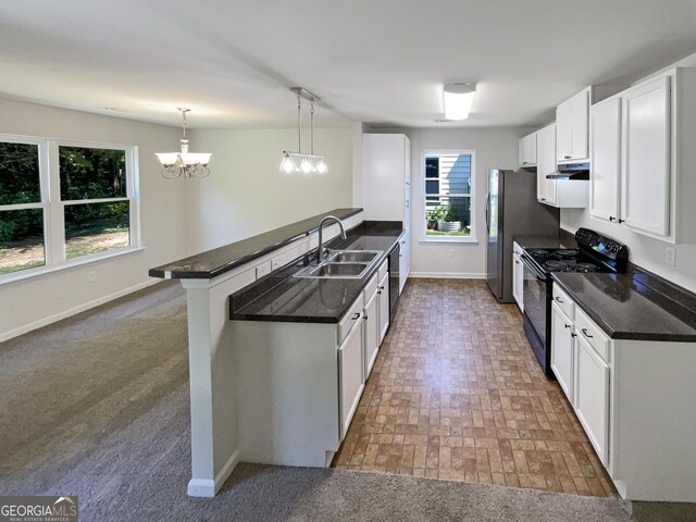 651 Walnut Woods Dr, Braselton, GA 30517 - kitchen featuring black appliances, dark countertops, white cabinetry, and brick patterned floors