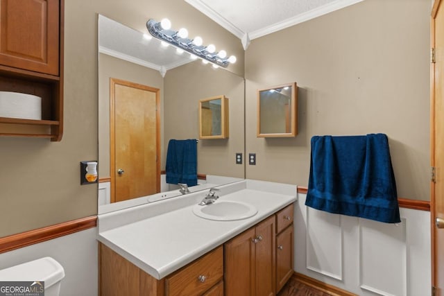310 Ridge Rd, Kingsland, GA 31548 - bathroom with ornamental molding, vanity, and wood finished floors