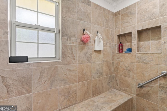 310 Ridge Rd, Kingsland, GA 31548 - full bathroom featuring ornamental molding and a tile shower