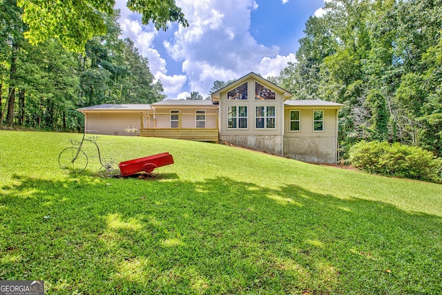 351 Weldon Rd, Palmetto, GA 30268 - rear view of house with a lawn