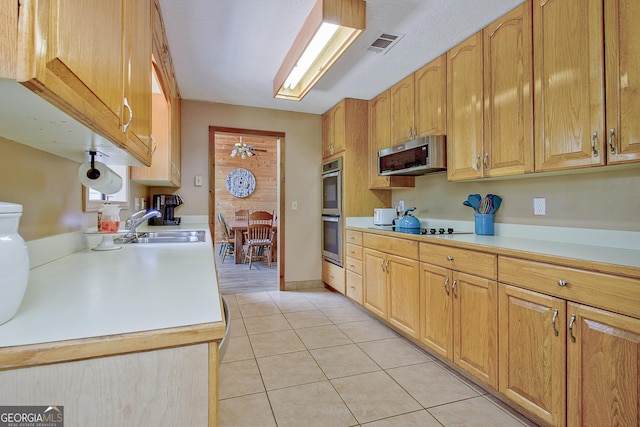 351 Weldon Rd, Palmetto, GA 30268 - kitchen with appliances with stainless steel finishes, light countertops, and light tile patterned floors