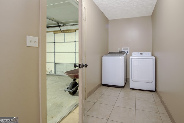 351 Weldon Rd, Palmetto, GA 30268 - laundry room featuring separate washer and dryer and light tile patterned flooring