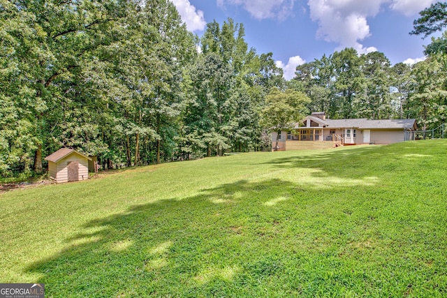 351 Weldon Rd, Palmetto, GA 30268 - view of grassy yard featuring a storage unit